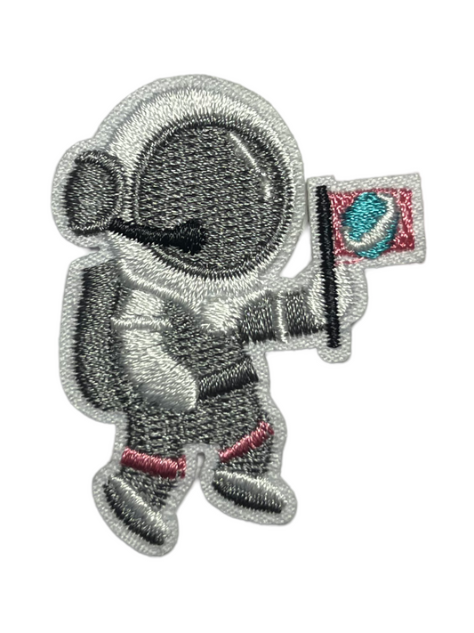 Astronaut med flagg