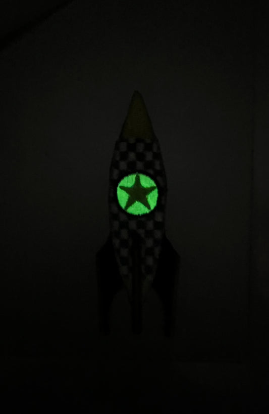 Checkered rocket - selvlysende